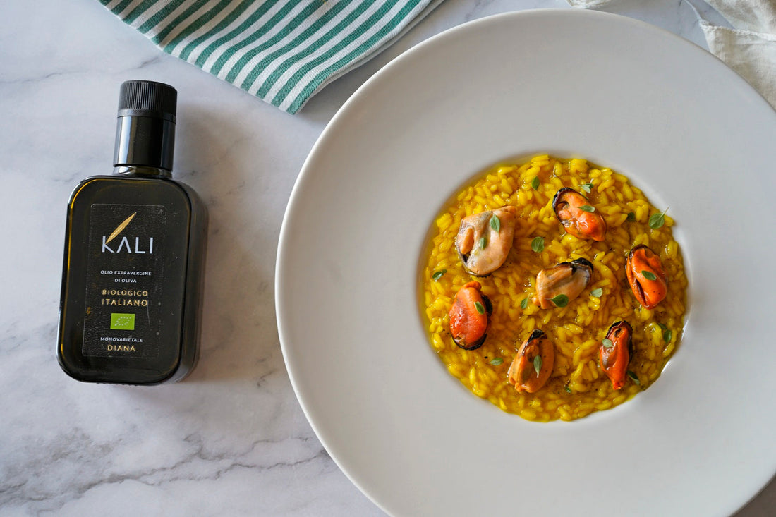 Mussel risotto with garlic peel-smoked EVOO and saffron sauce